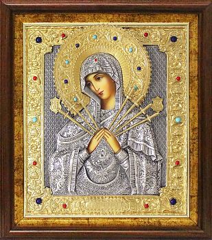 Икона Божией Матери "Семистрельная" в посеребренной ризе (окладе) с золочением в басменном киоте, Р-63.7К