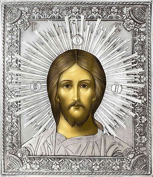 Иконы Господа Бога Иисуса Христа в серебряном окладе под старину